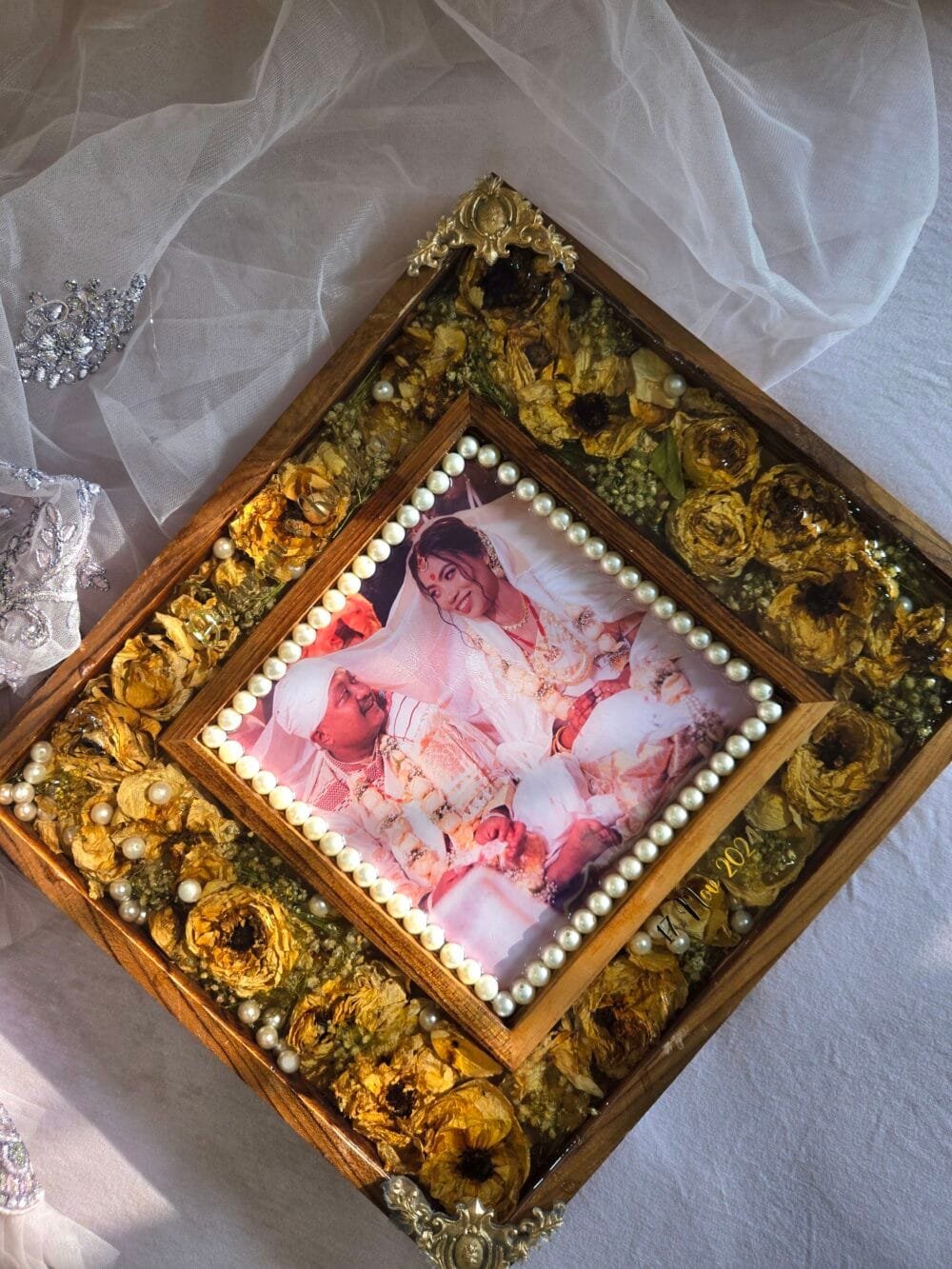 Double bordered wooden frame with pearl & golden detail